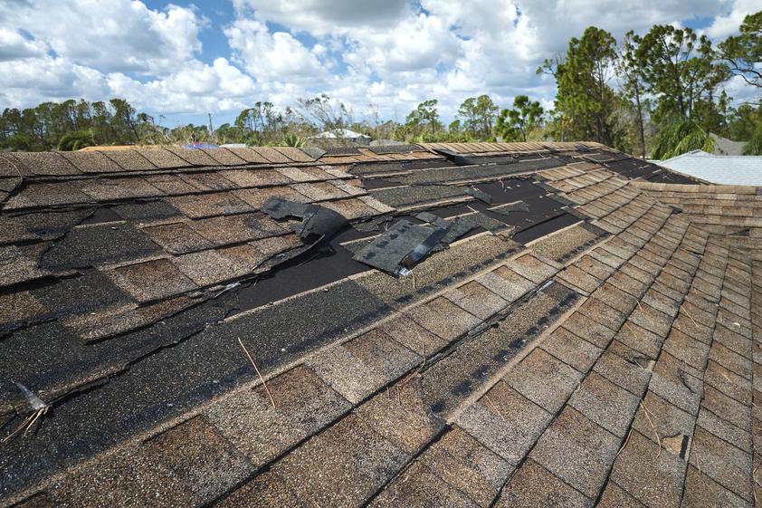 Damaged Roof with Missing Shingles